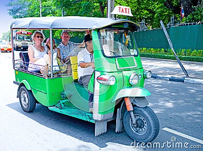 Tourist on '' tuk tuks '' in Bangkok Stock Photo