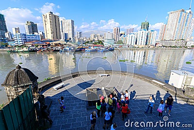 Tourist waching Manila pasig river view from Fort Santiago view deck, Intramuros, Manila, Philippines Editorial Stock Photo