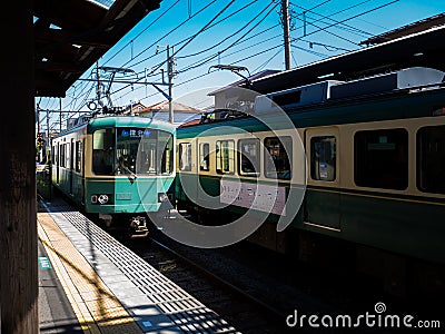 Tourist wait Odakyu Line train to Enoshima and Kamakura At Station In Japan : Kamakura - Sep 2018 Editorial Stock Photo