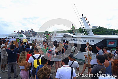 Tourist waiting to enter speedboat Editorial Stock Photo