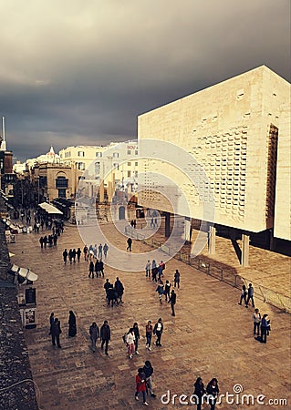 Tourist walking on the main street of Valletta, Malta Editorial Stock Photo