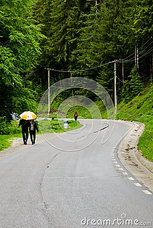 Tourist walking in the road Editorial Stock Photo