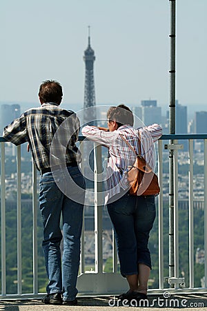 Tourist watching the eiffel tower Stock Photo