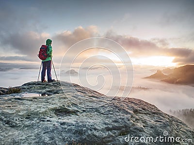 Tourist in windcheater with backpack enjoy amazing daybreak Stock Photo