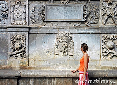 Tourist woman in orange Stock Photo