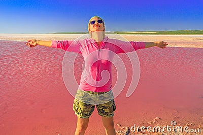 Tourist woman at Pink Lake Stock Photo