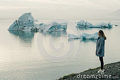 tourist woman on travel on Iceland by Jokulsarlon glacial lagoon on Iceland Editorial Stock Photo