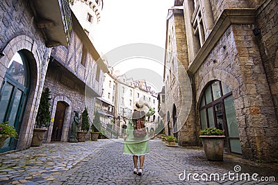 Tourist woman is traveling inside French village on Bana Hills in Danang Stock Photo