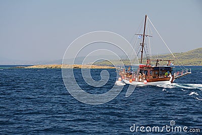 Tourist wooden boat in the Aegean Sea Stock Photo