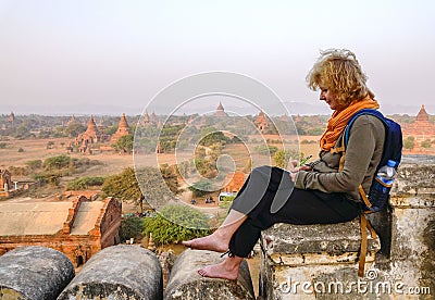 Tourist writes the itinerary in Bagan, Myanmar Editorial Stock Photo