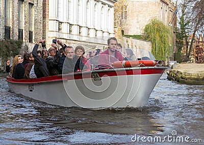 Touristic boat in Bruges, Belgium Editorial Stock Photo
