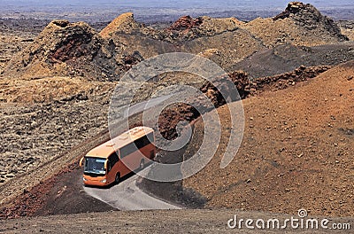 Touristic bus in the Timanfaya desert, Lanzarote Stock Photo