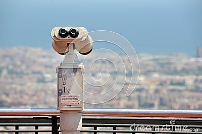 Touristic telescope with view of Barcelona Stock Photo