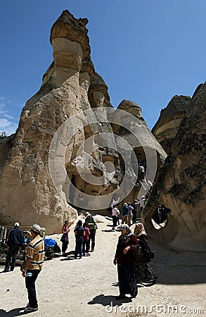 Tourists admire fairy chimneys at Pasabagi. Editorial Stock Photo