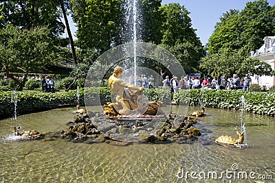 Tourists admire Greenhouse fountain with a sculpture of Triton, Editorial Stock Photo