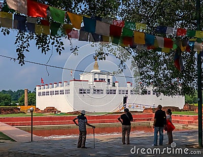 Tourists admiring Maya Devi Temple in Lumbini Editorial Stock Photo