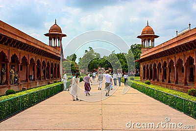 Agra, India - August 19, 2009: tourists along the boulevard through the Taj Mahal Eastern Gate in Agra, India Editorial Stock Photo