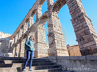 Tourists with ancient aqueduct, Segovia, Spain Editorial Stock Photo