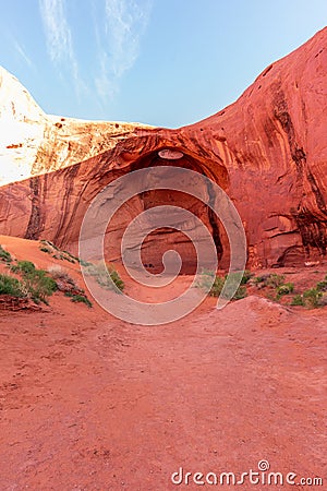 Tourists at the Big Hogan Formation in Monument Valley, Arizona Stock Photo