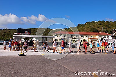 Tourists boarding a ferry Editorial Stock Photo
