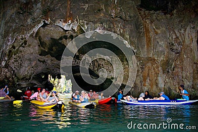 Tourists in boat swim into the cave of the island. Editorial Stock Photo