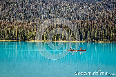 Tourists in canoe on Emerald Lake Editorial Stock Photo