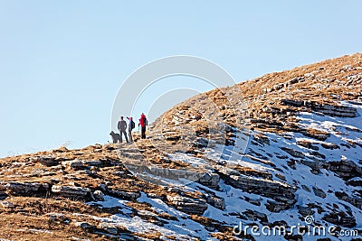 Tourists with dog enjoying views from Hinterrugg ridge Editorial Stock Photo