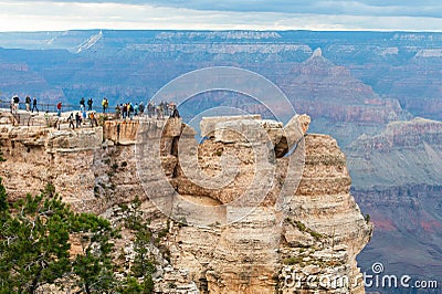 Tourists on the edge of the Grand Canyon deep, GC NP USA Editorial Stock Photo