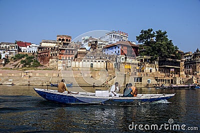 The tourists are enjoying boat ride on the Ganges in Varanasi. Editorial Stock Photo