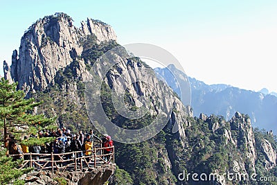 Tourists enjoy the panorama in the Yellow Mountains, China Editorial Stock Photo