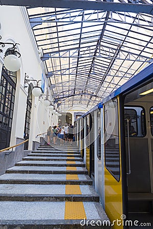 Tourists entering the funicular at Atan Stazione Funicolare Centrale Editorial Stock Photo