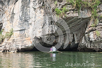 Tourists Entering the Hang Toi Cave Editorial Stock Photo