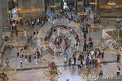 Tourists explore the vast interior of Hagia Sophia Editorial Stock Photo