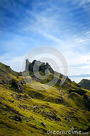 Tourists favourite place in Scotland - Isle of Skye. Very famous castle in Scotland called Eilean Donan castle. Scotland green nat Stock Photo