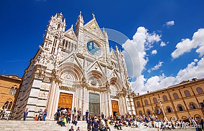 5.05.2017 - Tourists gathered on the steps of the Siena Cathedral Duomo di Siena Editorial Stock Photo