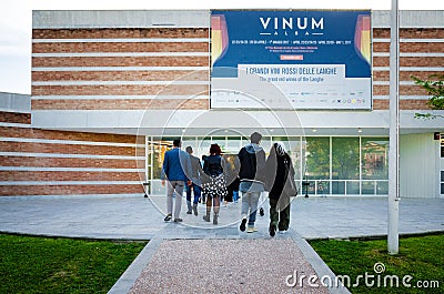 Tourists going to Vinum in Alba Piedmont, Italy Editorial Stock Photo