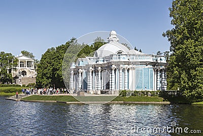 Tourists at the Grotto pavilion on the banks of the Big Pond in Tsarskoye Selo. Editorial Stock Photo