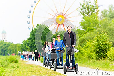 Tourists having Segway sightseeing Stock Photo