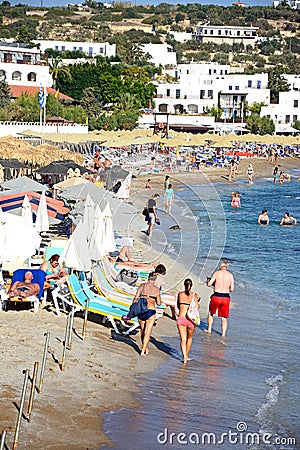 Tourists on Hersonissos beach, Crete. Editorial Stock Photo