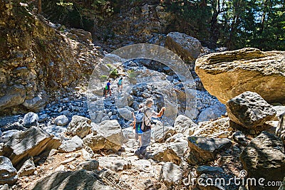 Tourists hike in Samaria Gorge Editorial Stock Photo