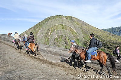 Tourists horse rider on Mt.Bromo national park, Indonesia Editorial Stock Photo