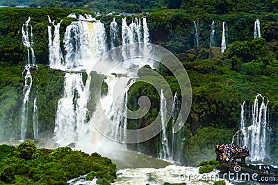 Tourists at Iguazu Falls Stock Photo