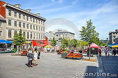 Tourists on Jacques Cartier place. Editorial Stock Photo