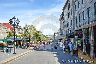 Tourists on Jacques Cartier place. Editorial Stock Photo