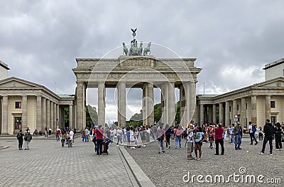 Tourists and local people at the Brandenburger Tor (Brandenburg Gate). Berlin, Germany. Editorial Stock Photo