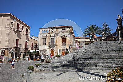 Tourists and local People in the Streets of Cefalu on Sicily. Italy Editorial Stock Photo