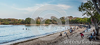 Tourists and locals enjoying the beaches at Nusa Dua Editorial Stock Photo