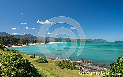 Tourists and locals on Kailua beach on east coast of Oahu Editorial Stock Photo
