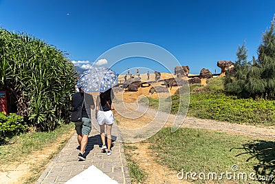 Tourists looking around the Yehliu Geopark, New Taipei City, Taiwan, Aug 22,2019 Editorial Stock Photo