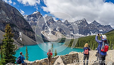 Tourists looking at Moraine lake Editorial Stock Photo